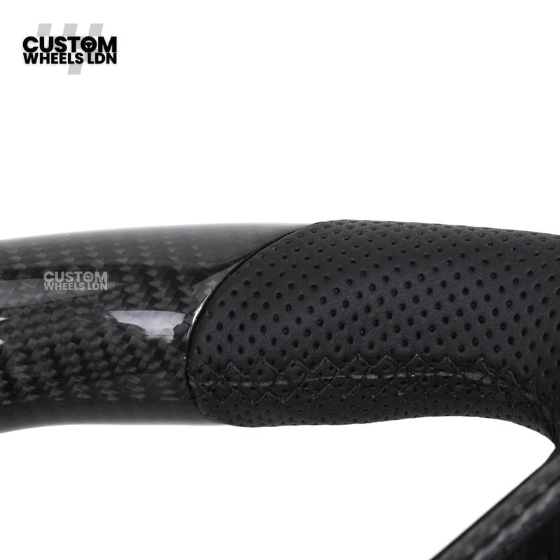 Toyota Custom Land Cruiser 300 Series Steering Wheel – Carbon Fiber, Flat Bottom, Perforated Leather Grips | Fits 2022+ LC300 Models | Plug & Play | Premium Retrofit Upgrade | Full Custom Build Available