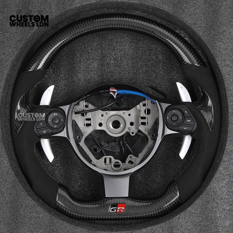 Toyota Custom GR86 Steering Wheel – Carbon Fiber, Flat Bottom, GR Badge, Paddle Shifters | Fits GT86, GR86, BRZ, Auris + More | Plug & Play | Full Customisation Available | Upgrade for Older Models