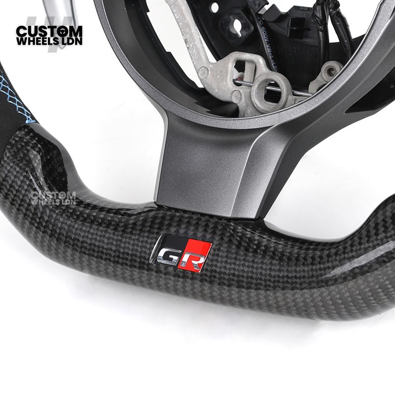 Toyota Custom GR86 Steering Wheel – Carbon Fiber, Flat Bottom, GR Badge, Paddle Shifters | Fits GT86, GR86, BRZ, Auris + More | Plug & Play | Full Customisation Available | Upgrade for Older Models