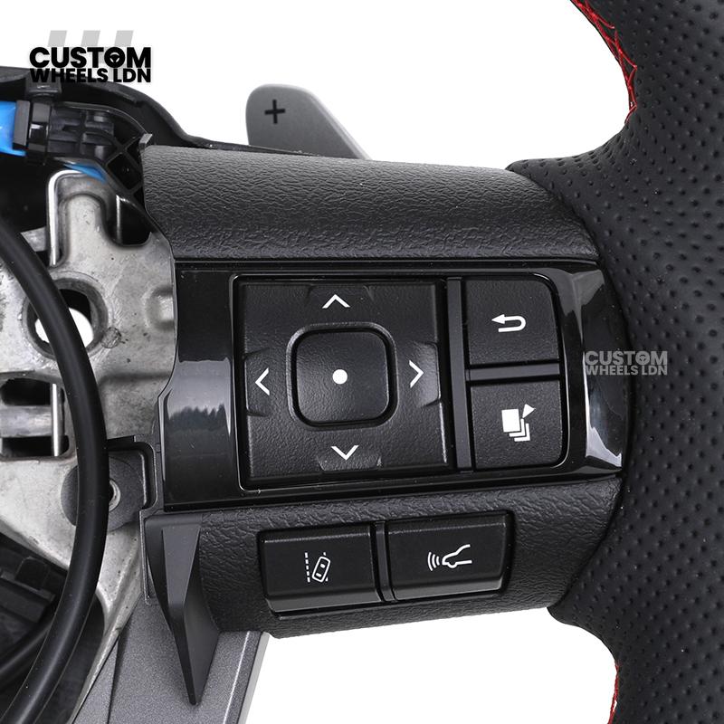 Toyota Custom Hilux Flat Bottom Steering Wheel – Carbon Fiber & Perforated Leather with Red Center Stripe | Fits 2021+ Hilux Models | Plug & Play | Premium Upgrade for Off-Road & Daily Driving | Made to Order | Performance Look & Feel