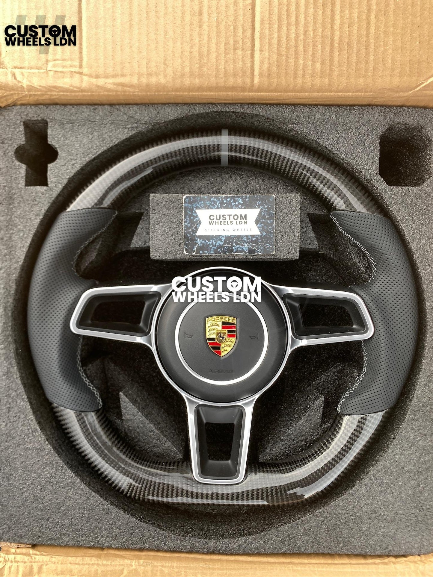 Porsche Custom Flat Bottom Steering Wheel – Gloss Carbon Fibre, Perforated Leather, Grey 12 O’Clock Stripe | Fits 997.1, 997.2, 991.1, 987, Cayman, Boxster, Macan, Cayenne + more | Plug & Play | With Airbag | Upgrade for Older Models Available