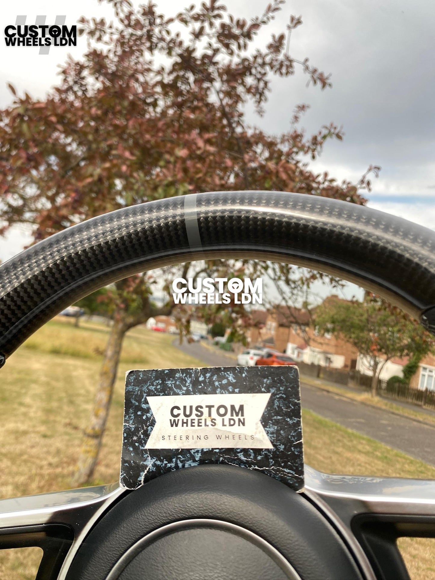 Porsche Custom Flat Bottom Steering Wheel – Gloss Carbon Fibre, Perforated Leather, Grey 12 O’Clock Stripe | Fits 997.1, 997.2, 991.1, 987, Cayman, Boxster, Macan, Cayenne + more | Plug & Play | With Airbag | Upgrade for Older Models Available