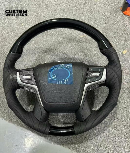 Toyota Custom Steering Wheel – Piano Black Top, Perforated Leather Grips, OEM Controls | Fits Hilux, Fortuner, Land Cruiser Prado + more | Complete Wheel with Airbag | Plug & Play Retrofit Upgrade Older Models