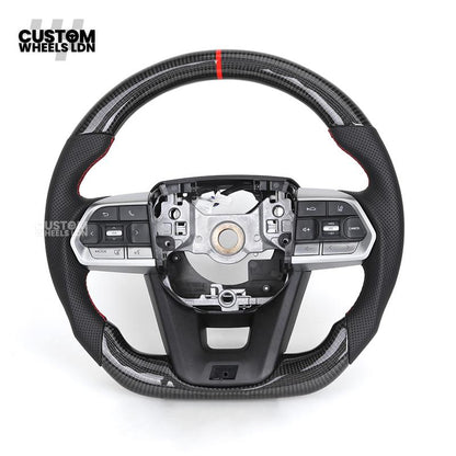 Toyota Custom GR Steering Wheel – Carbon Fiber, Flat Bottom, Red Center Stripe, Perforated Grips | Fits Yaris GR, Corolla GR + More | Plug & Play | Sporty Upgrade with Paddle Cutouts | Track-Inspired Retrofit
