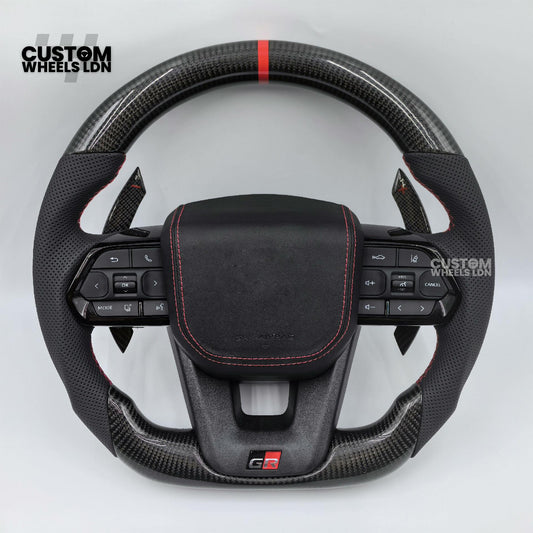 Toyota Custom GR Steering Wheel – Carbon Fiber, Flat Bottom, Red Center Stripe, Perforated Grips | Fits Yaris GR, Corolla GR + More | Plug & Play | Sporty Upgrade with Paddle Cutouts | Track-Inspired Retrofit