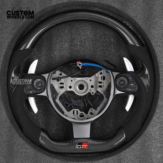 Toyota Custom GR86 Steering Wheel – Carbon Fiber, Flat Bottom, GR Badge, Paddle Shifters | Fits GT86, GR86, BRZ, Auris + More | Plug & Play | Full Customisation Available | Upgrade for Older Models