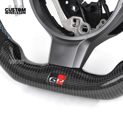 Toyota Custom GR86 Steering Wheel – Carbon Fiber, Flat Bottom, GR Badge, Paddle Shifters | Fits GT86, GR86, BRZ, Auris + More | Plug & Play | Full Customisation Available | Upgrade for Older Models