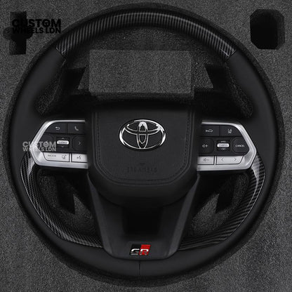 Toyota GR Custom Steering Wheel – Carbon Fibre, GR Badge, Black Leather Grips, OEM Controls | Fits GR Yaris, GR Corolla, GR86 + more | Plug & Play | Retrofit Upgrade for Older Models