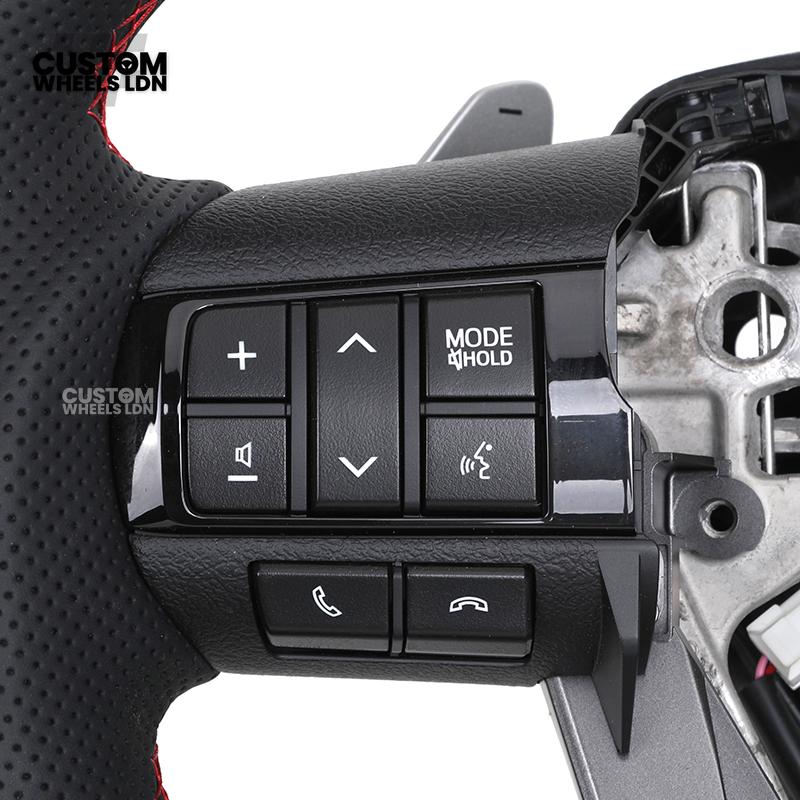 Toyota Custom Hilux Flat Bottom Steering Wheel – Carbon Fiber & Perforated Leather with Red Center Stripe | Fits 2021+ Hilux Models | Plug & Play | Premium Upgrade for Off-Road & Daily Driving | Made to Order | Performance Look & Feel