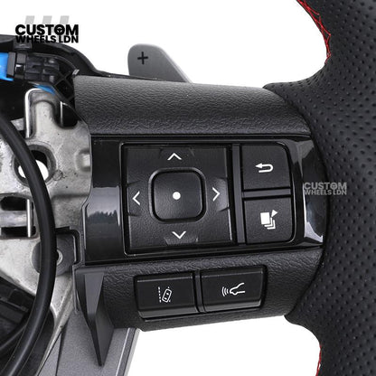 Toyota Custom Hilux Flat Bottom Steering Wheel – Carbon Fiber & Perforated Leather with Red Center Stripe | Fits 2021+ Hilux Models | Plug & Play | Premium Upgrade for Off-Road & Daily Driving | Made to Order | Performance Look & Feel
