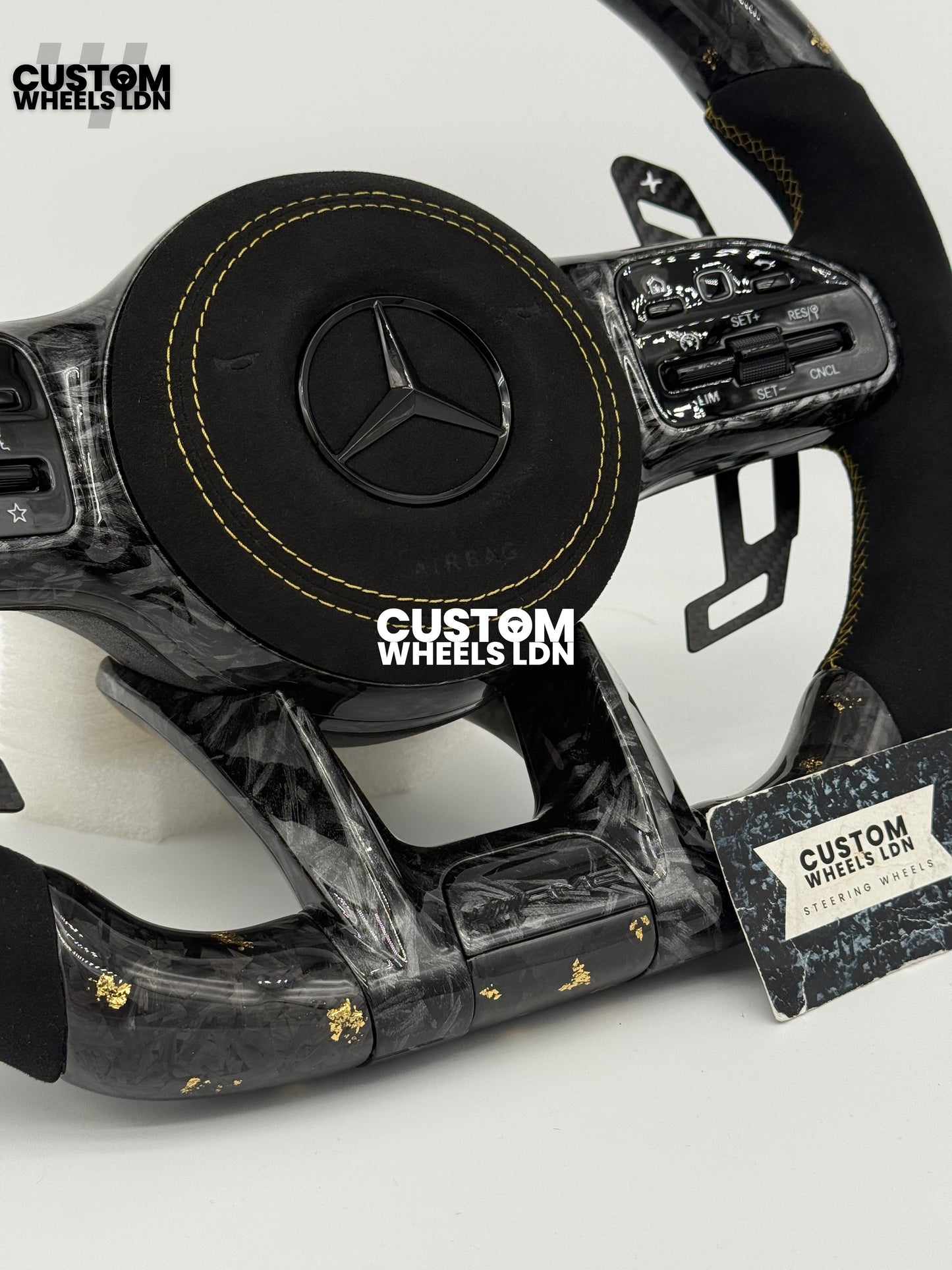 Mercedes Custom Gold Flake Forged Carbon Flat Bottom Steering Wheel – Magnetic Extended Paddles, OEM Black Buttons | Fits A-Class, C-Class, E-Class, GLC, GLE + more | Plug & Play | With Airbag | Upgrade for Older Models Available