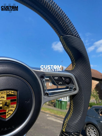 Porsche Custom Flat Bottom Steering Wheel – Gloss Carbon Fibre, Perforated Leather, Yellow Stitching & Stripe | Fits 991, 997, 981, 718, Boxster, Cayman, Macan, Panamera + more | Plug & Play | With Airbag | Upgrade for Older Models Available