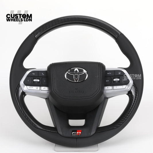 Toyota GR Custom Steering Wheel – Carbon Fibre, GR Badge, Black Leather Grips, OEM Controls | Fits GR Yaris, GR Corolla, GR86 + more | Plug & Play | Retrofit Upgrade for Older Models